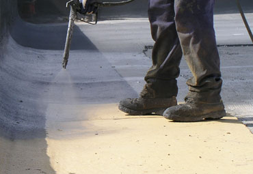 Coating systems over Toronto spray foam roof systems